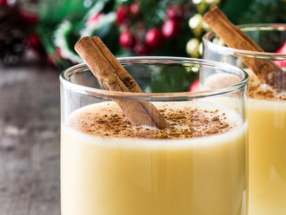 Cinnamon stick in a glass of eggs