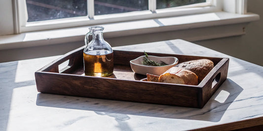 Delta 9 olive oil for edibles in a glass bottle, served with bread and herbs.